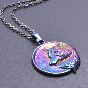 Macro detail of a 3D wolf head pendant with a vibrant rainbow finish on a steel chain