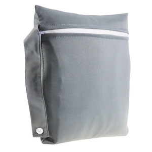 Gray waterproof diaper wet bag with white zipper and snap handle for strollers
