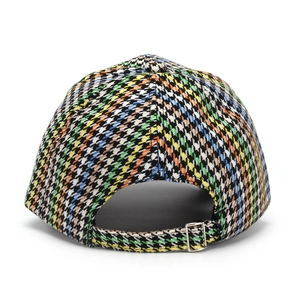 Detail of multi-color houndstooth woven baseball cap with adjustable metal buckle back