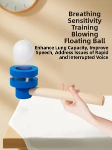 Macro view of floating ball trainer with blue wooden mouthpiece and light white ball