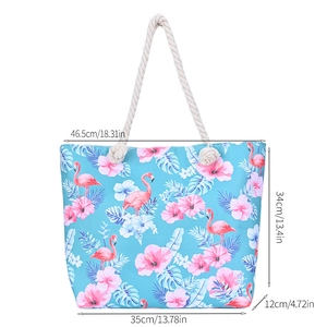 Detailed size chart of flamingo beach bag with rope handles and floral pattern dimensions