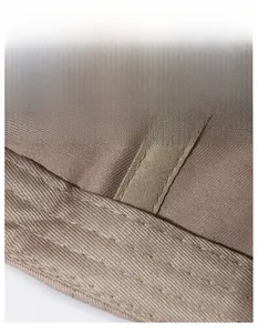 Detail view of the moisture-wicking sweatband inside the distressed baseball cap