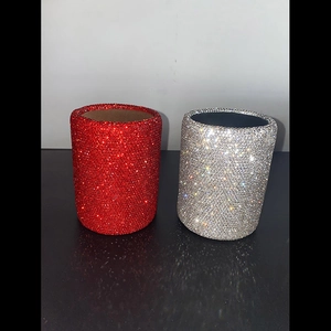Detail of red and silver luxury rhinestone sleeves with sparkling crystal embellishments