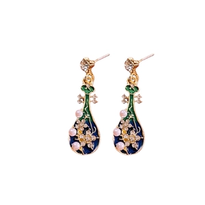 Vintage gold earrings with blue floral enamel, delicate pearls and sparkling crystals