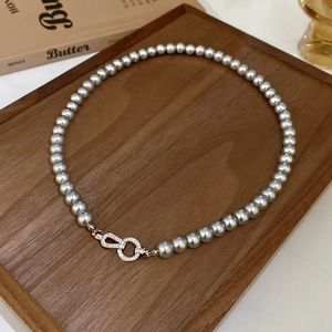 French vintage silver grey pearl necklace with a sparkling infinity rhinestone clasp