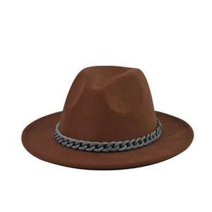 Close-up of brown wide brim fedora hat featuring a matte grey chain link decoration