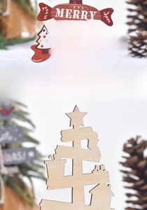 Front and back detail of a wooden Merry Christmas sign with snowmen and tree motifs