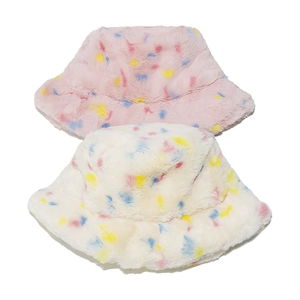 Winter plush faux fur bucket hats for women in pink and beige with colorful dots
