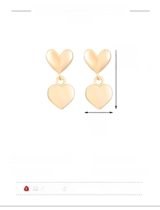 Detail view of gold double heart earrings with size specs 2.1x1cm in copper material