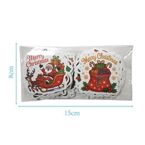 Detail view of holographic Christmas stickers with Santa Claus and red gift bag patterns