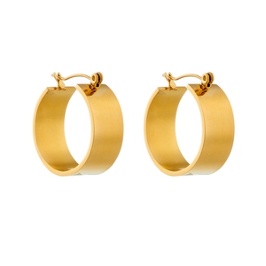 Minimalist thick gold hoop earrings with brushed metal texture and geometric design