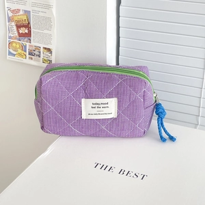 Quilted purple gingham octagonal pouch with green zipper and blue rope puller