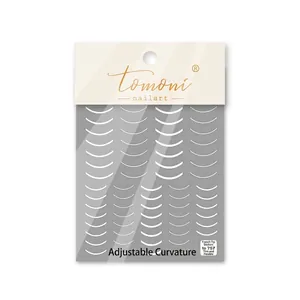 White French manicure nail stickers set with multiple thin curved designs on a card