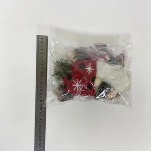Detailed size measurement of a 21cm Christmas gnome plush with knitting hat and ruler