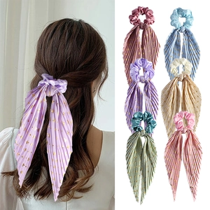 Pleated silk scrunchies with long ribbons and gold foil dots in six vintage colors