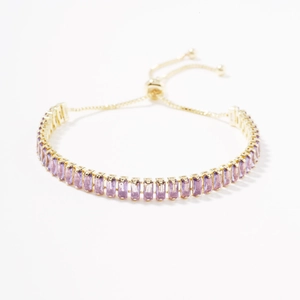 Adjustable gold tennis bracelet with rectangular purple zircon stones in a pull-string design