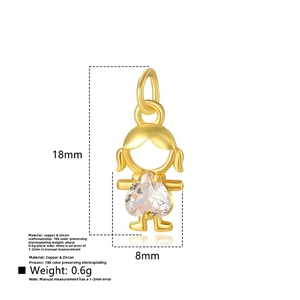 Detailed close-up of a gold-plated girl pendant with heart-shaped cubic zirconia stone