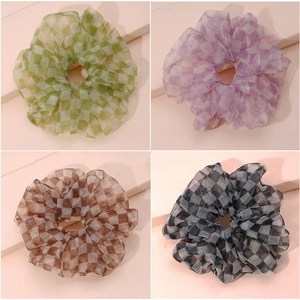 Elegant checkerboard organza scrunchies in green, purple, brown, and black colors
