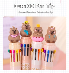 Macro detail of cute 3D capybara characters on multi-color retractable ballpoint pens
