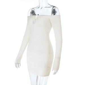 Detail of white off-shoulder mini dress with 3D jacquard texture and bodycon fit