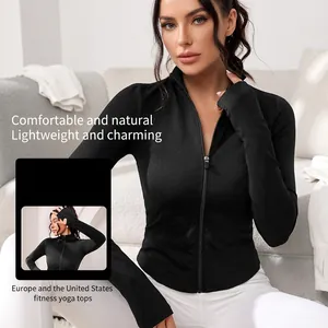 Slim fit black yoga jacket with full zipper, stand collar, and thumbhole sleeves