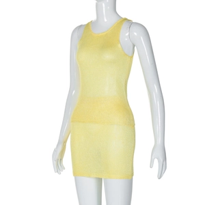 Detailed side view of yellow mesh knit sleeveless mini dress on a white mannequin