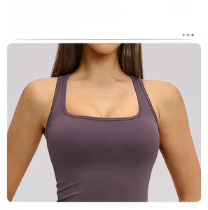 Detail shot of the square neckline on this purple athletic vest highlighting the collarbone