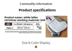 Detailed view of white knitted Christmas stocking with red letter T and its weight measurement