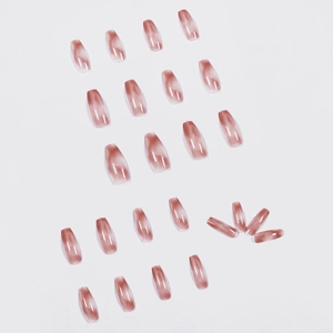 Glossy amber brown marble press-on nails in long coffin shape with smoky texture