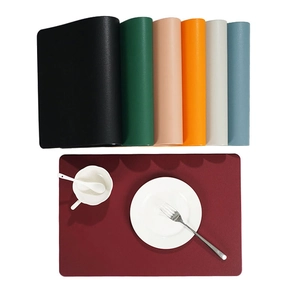 Nordic faux leather placemats in multiple colors with waterproof and heat-resistant finish