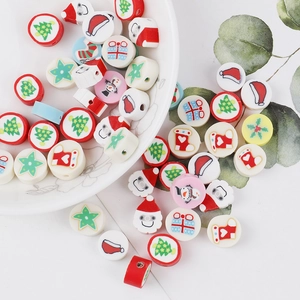 Detailed view of colorful Christmas themed polymer clay beads for DIY jewelry making