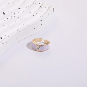 Detail of lavender enamel Evil Eye open ring with 14K gold plated finish and adjustable band