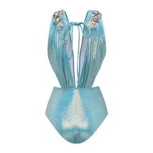 Detail of light blue metallic swimsuit with floral pearl accents and crystal decor