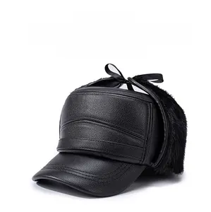 Close-up of textured black faux leather winter hat with thick faux fur earflaps
