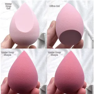 Pink makeup sponge set showing teardrop cut, olive cut, and teardrop shapes on white cloth