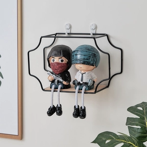 Black geometric wall shelf with wooden base and miniature game figures decor