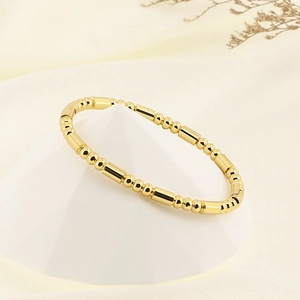 Polished 18K gold plated bamboo link bracelet made of durable stainless steel