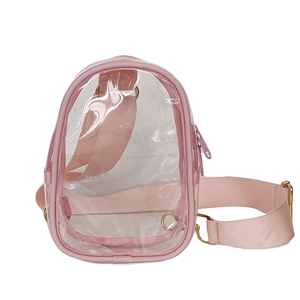 Pink transparent PVC crossbody chest bag with adjustable strap and gold hardware