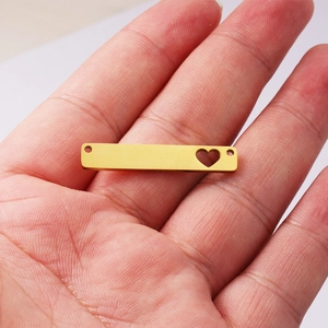 Gold rectangular stainless steel charm with heart cutout and double holes for DIY jewelry
