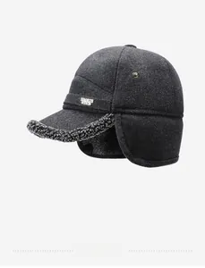 Detail view of winter ear flap cap showing thick wool texture and warm fleece lining