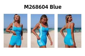 Detail view of sky blue color block tankini with crossover V-neck and functional side pocket