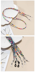 Detail of colorful beaded eyewear strap with silver lobster clasps and silicone loops