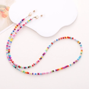 Colorful beaded acrylic eyeglass chain with anti-slip silicone loops on white background