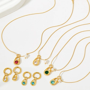 Gold stainless steel jewelry set featuring colorful zircon pendants and small white pearls