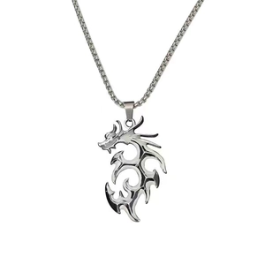 Close-up of hip hop style silver dragon pendant on box chain necklace