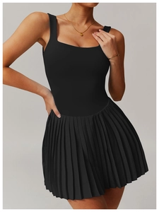 Detailed view of black tennis dress with square neck and pleated skirt for workout