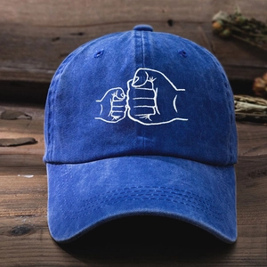 Classic navy blue washed cotton baseball cap with fist bump embroidery and curved brim