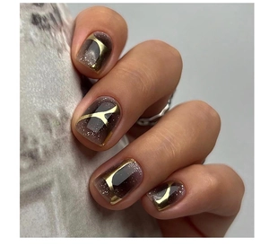 Detail of square nails with gold foil and silver glitter on smoky grey base