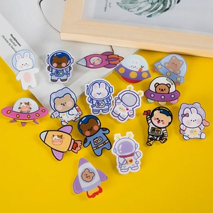 Space exploration theme acrylic cartoon brooches set featuring astronaut and rocket designs