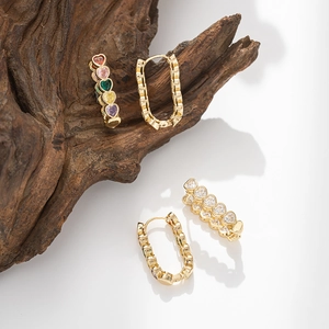 U-shaped gold heart earrings with colorful zircons and vintage crinkle texture
